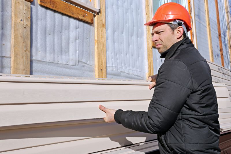 Installing Vinyl Siding on a House